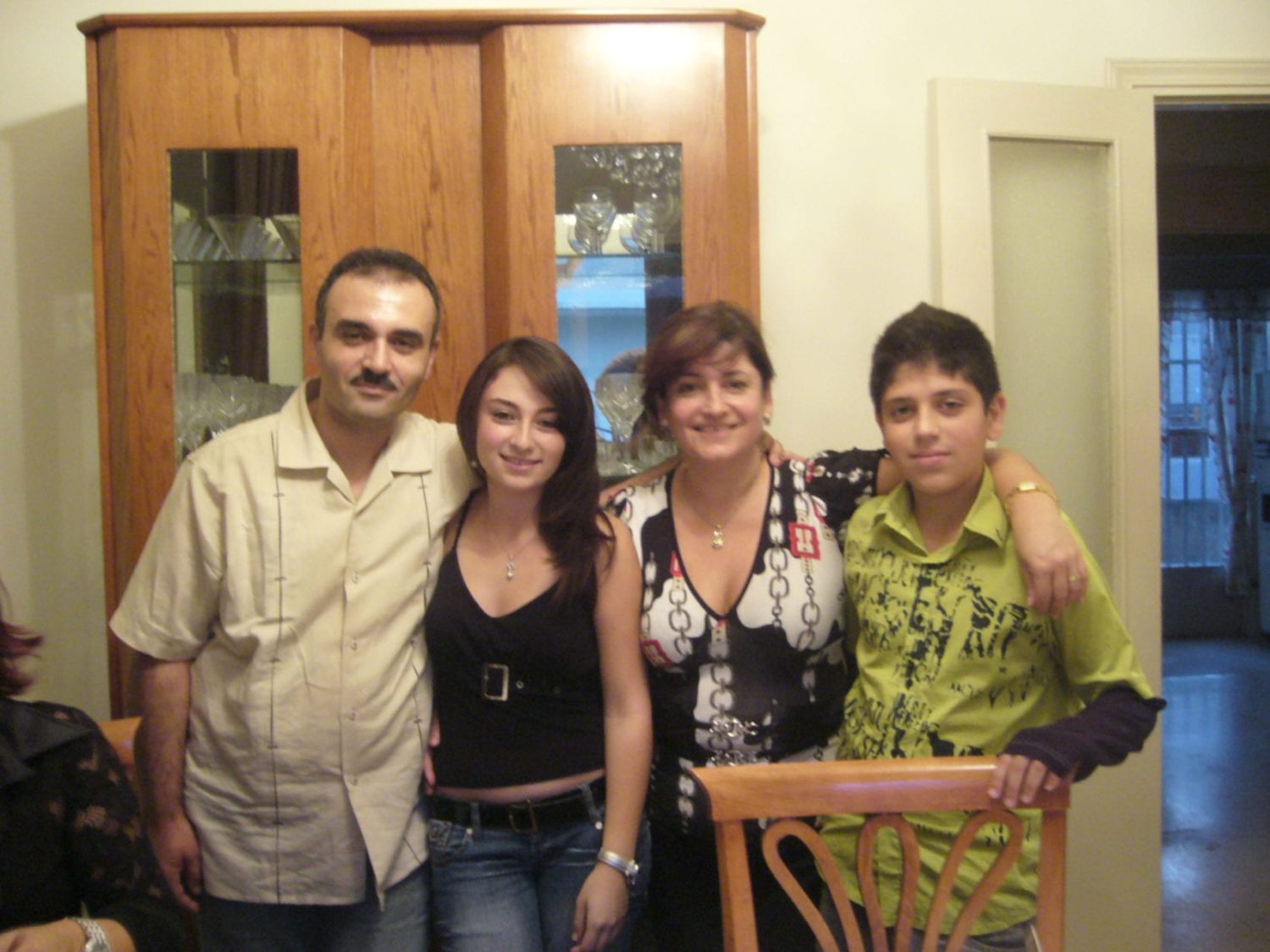 Joanne with her mother, father and younger brother