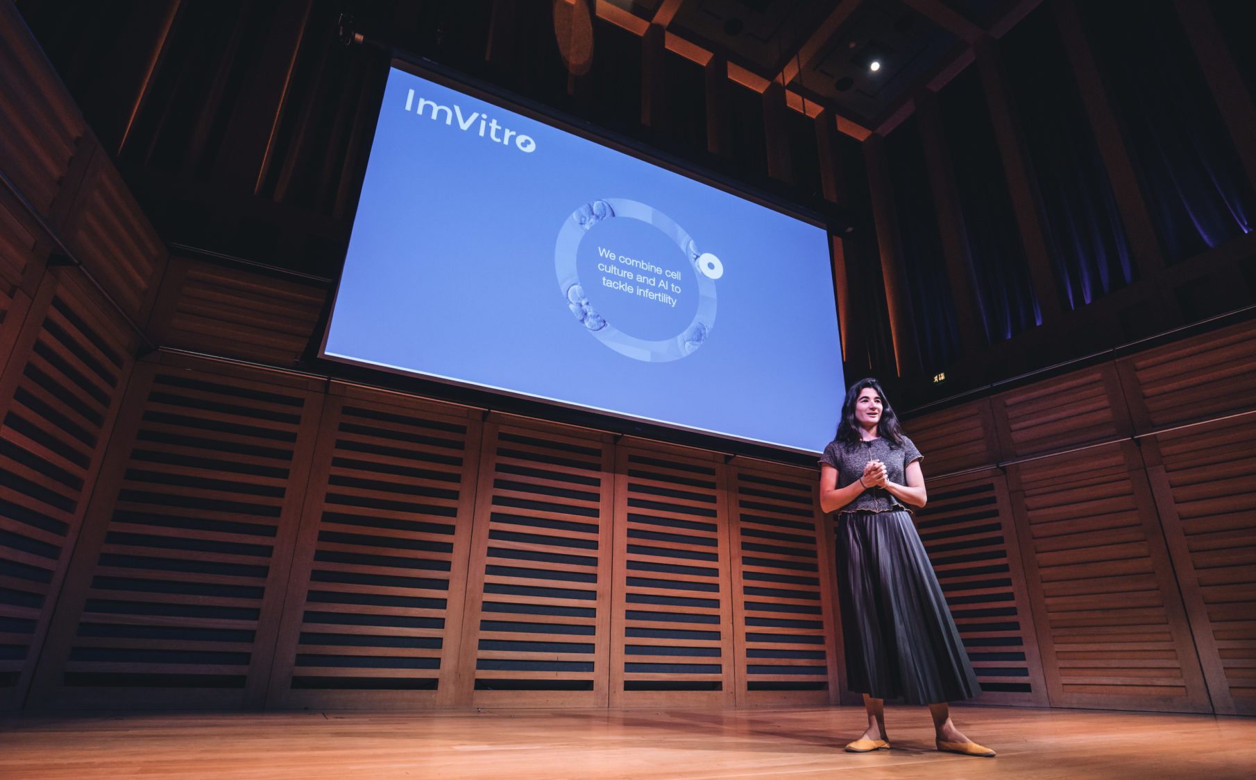 Alexandra on stage at Demo Day, delivering the final pitch