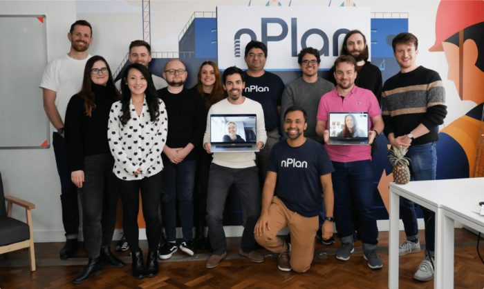 Group of people holding laptops