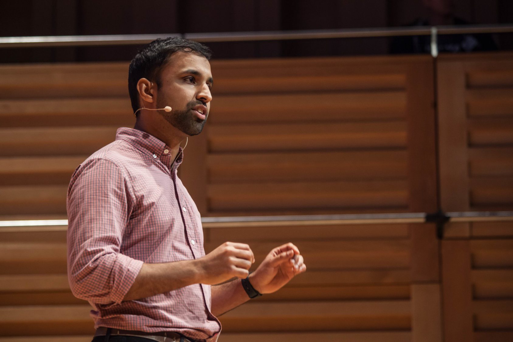 Alan's co-founder Dev pitches at Demo Day