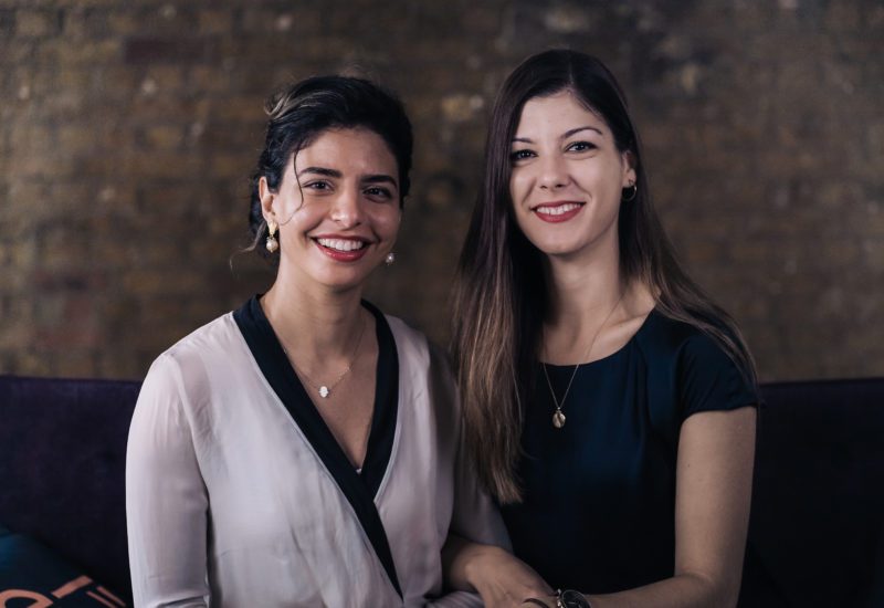 Two women smiling